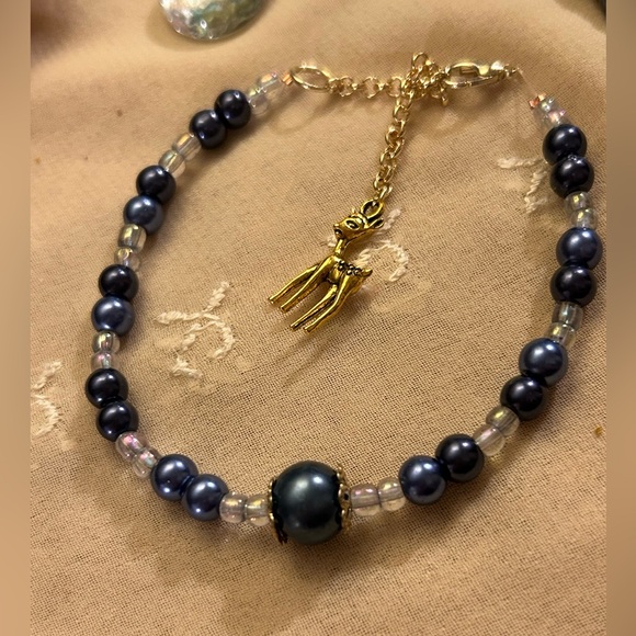 Set of 4 Blue Iris mother of pearl colored bracelets w/charms - Picture 10 of 11